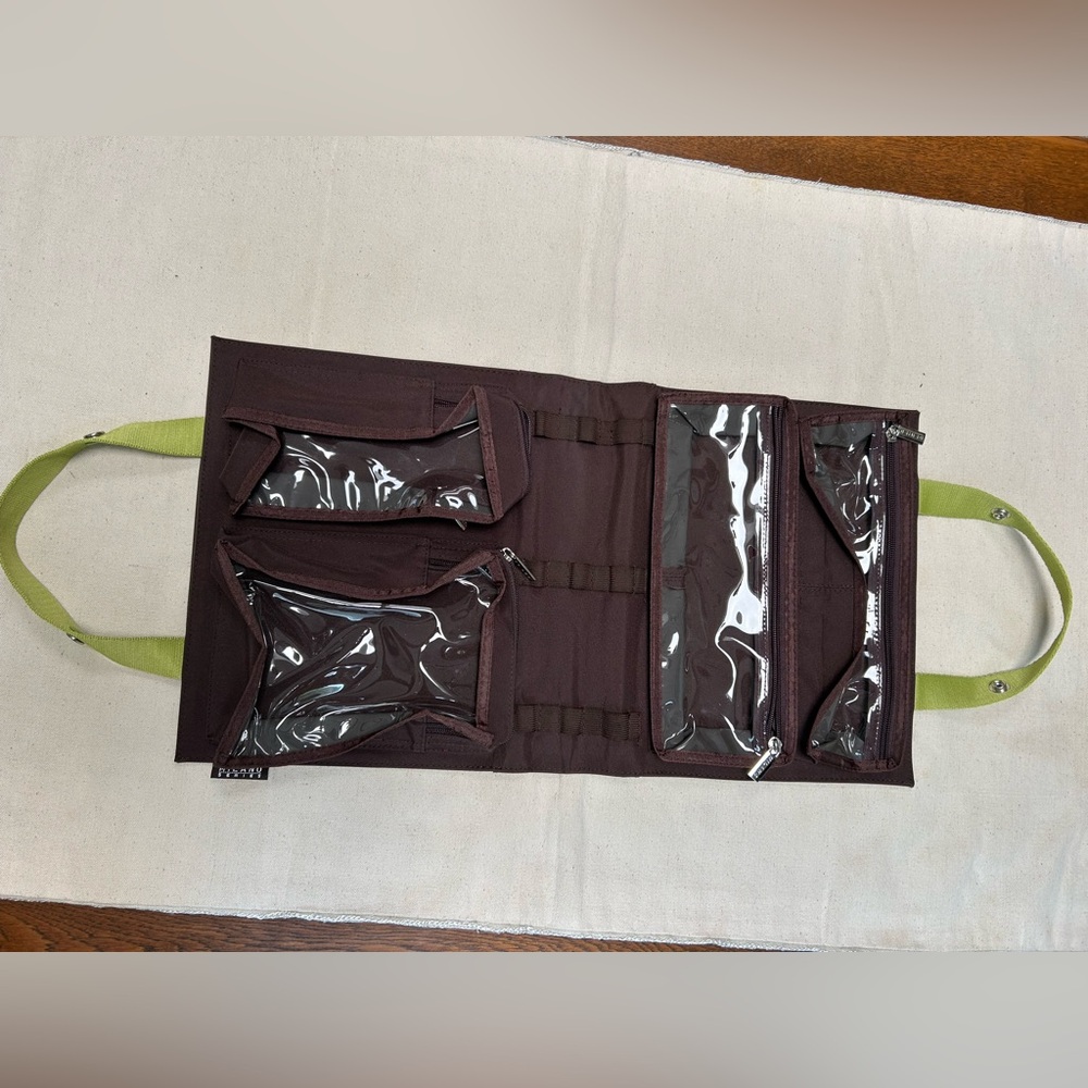 New W/O tag Milano Series Makeup Tote, foldable. Zipper sections keep all secure